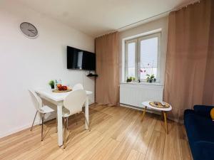 Et tv og/eller underholdning på Dominica Apartments