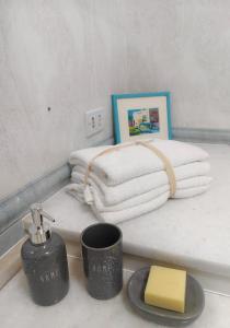 En eller flere senge i et værelse på AR Lodge