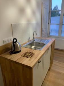 Køkken eller tekøkken på Résidence ARTHUS Ménalippe + 29 billeder