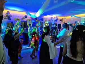 a group of people dancing at a party at Ale Widok in Wisła