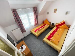 En eller flere senge i et værelse på Casa Stana