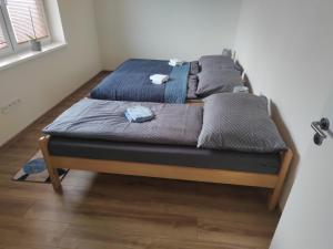 two beds sitting next to each other in a bedroom at APARTMÁN KATKA Stošice - Liptovský Mikuláš, súkromue & pohodlie in Liptovský Mikuláš
