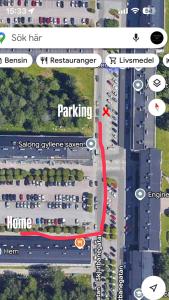 a map of a parking lot with a red line at Exotisk lägenhet/ Friparkering in Västerås +1 photo