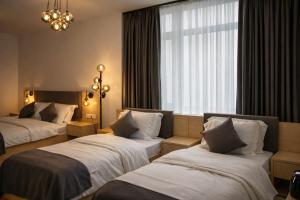 Katil atau katil-katil dalam bilik di Niko Hotel am Hannover Hbf +27 gambar