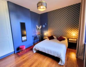 En eller flere senge i et værelse på Le Havre Haussmannien - Balnéo, proche Centre-ville et Gare