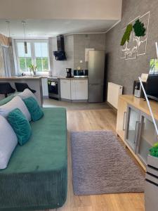 Køkken eller tekøkken på Apartamenty Paszkówka