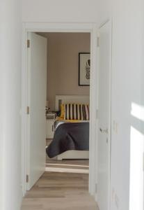 En eller flere senge i et værelse på Sarah's Penthouse in Sliema