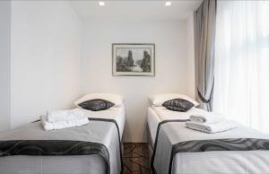 Letto o letti in una camera di Hotel Grad