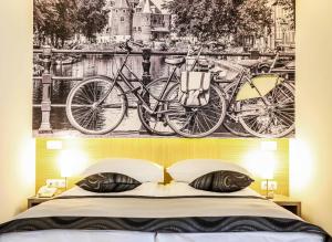 Letto o letti in una camera di Hotel Grad