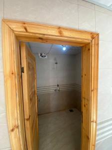 an open door to a room with a room at Wadi Rum Desert Experience in Wadi Rum +103 photos