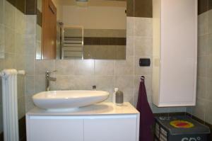 Ванная комната в Appartamento Gassman - Holiday Apartment in Milano