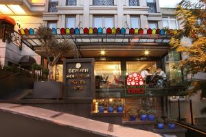 a store with a sign in front of a building at Berjer Boutique Hotel & Spa in Istanbul