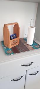 a box sitting on top of a counter with a candle at Departamento Tunuyan in Monte Hermoso +2 photos