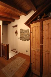 Posteľ alebo postele v izbe v ubytovaní B&B Vecchio Torchio di Bard