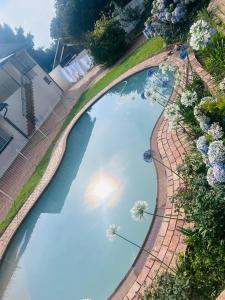 an overhead view of a large pool of water at Crest Premium in Johannesburg