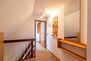 a staircase in a house with a stair case at Am Grooten Steen, Whg 19 in Duhnen