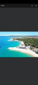 an aerial view of a beach and the ocean at Petra in Biograd na Moru
