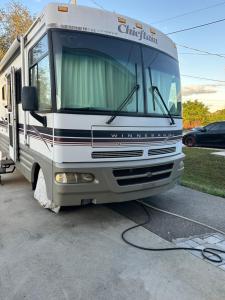 a camper is hooked up to a truck at Comfortable and cozy RV in Lehigh Acres