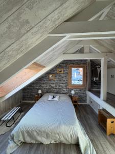 Postel nebo postele na pokoji v ubytování Le Martagon