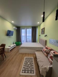 TV/trung tâm giải trí tại Bamboo Beach Tsikhisdziri