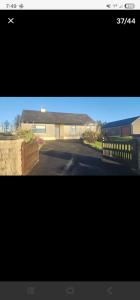 a picture of a house with a driveway at Seaview House in Donegal