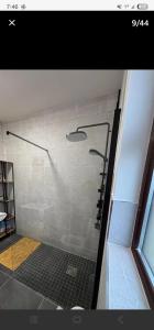 a shower with a glass door in a bathroom at Seaview House in Donegal +25 photos