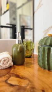 a kitchen counter with a green pepper on a table at Personal blue house Madeira in Santa Cruz
