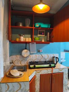 a kitchen with a sink and a counter top at WMSAJ HOMEs in Narok