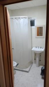 a bathroom with a sink and a shower and a toilet at RM RinconMoreno II in Colorado River