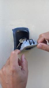 a person is putting a wire into a wall outlet at RM RinconMoreno II in Colorado River