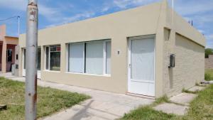 a building with white doors and a pole at RM RinconMoreno II in Colorado River