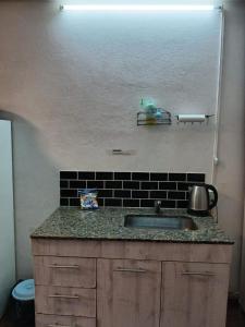 Køkken eller tekøkken på Monoambiente Centrico a Mts Estacion San Fernando