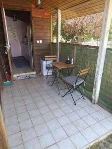 En terrasse eller udendørsområde på By Jess