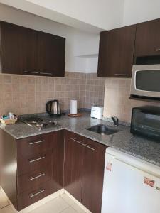 Køkken eller tekøkken på PASAJE EN EL CENTRO DE LOMAS + 6 billeder