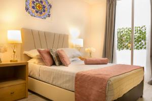 En eller flere senge i et værelse på Santuario De Luna, Departamento