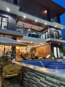 a resort with a swimming pool and a bar at Casa Rubio private Resort in Los Baños