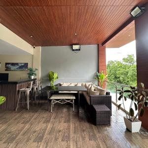 a living room with a couch and a table at Casa Rubio private Resort in Los Baños