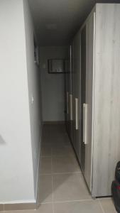 a corridor of a room with a hallway at Aconchego da Maria 2! in Mangaratiba