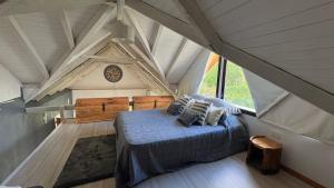 a bedroom in a tent with a bed in it at Complejo Los Saucos II in El Hoyo