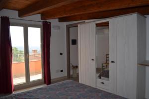 Postel nebo postele na pokoji v ubytování Terrazza sul golfo degli angeli