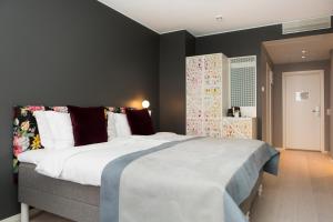 Postel nebo postele na pokoji v ubytování Elite Palace Hotel & Spa