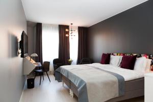 Postel nebo postele na pokoji v ubytování Elite Palace Hotel & Spa