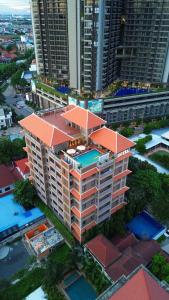 an overhead view of a building with an orange roof at Jaya Suites Hotel in Phnom Penh