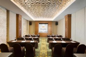a room with rows of tables and chairs at Padma Resort Ubud in Payangan +66 photos
