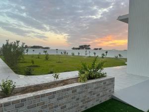 a view of the water from a house at Rimal Chalet in Barka