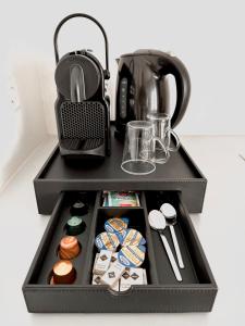 Tiện nghi pha trà/cà phê tại HOMEFY - Gasthaus Düsseldorf - Meerbusch