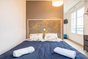 En eller flere senge i et værelse på L'Eclose - Les Korrigans