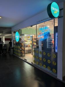 a store with a display window with donuts in it at Spacious 3B3R Unit in BukitJalil in Kuala Lumpur