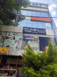 a building with signs on the side of it at AERO View Residency in Bangalore