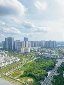 an aerial view of a city with tall buildings at Capsule Masterise Vinhomes in Gia Lâm Pho